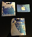 Mold stains on a gift card with package which was stored unintentionally for six months in an open compartment in a motorcycle