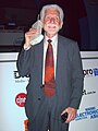 Image 27Martin Cooper of Motorola, shown here in a 2007 reenactment, made the first publicized handheld mobile phone call on a prototype DynaTAC model on 3 April 1973. (from Mobile phone)
