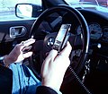 Image 45A New York City driver holding two phones (from Smartphone)