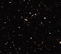 This image from the NASA/ESA/CSA James Webb Space Telescope shows an arrangement of ten galaxies. The 3 million light-year-long filament is anchored by a quasar.