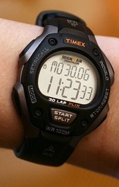 A Timex digital watch with an always-on display of the time and date