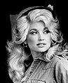 Denim jackets and headbands were also a trend, modeled here by Dolly Parton in 1977