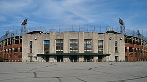 The façade of a concrete, brick, and steel and concrete ballpark