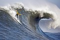  A surfer in the Pacific Ocean at the 2010 Mavericks competition, village of Princeton-by-the-Sea, northern California