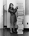 Image 13Margaret Hamilton standing next to the navigation software that she and her MIT team produced for the Apollo Project.