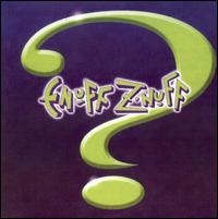 The band's logo over top a large question mark, both bright green over a purple background