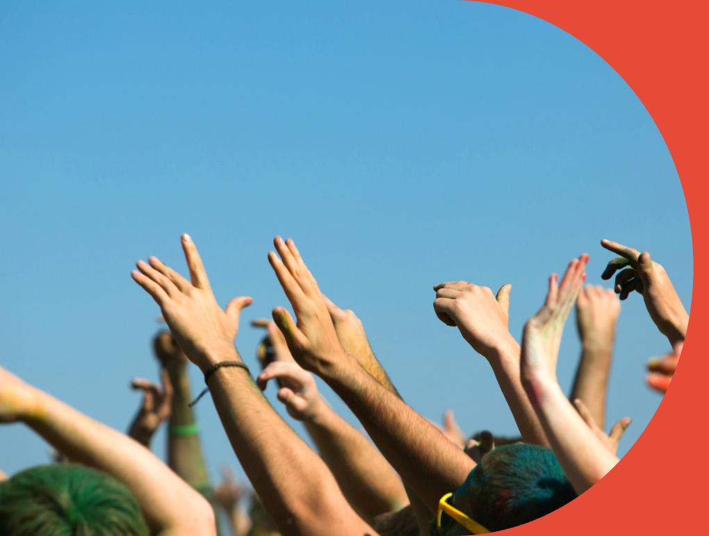 Crowd of raised hands at music festival or concert