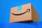 An image of an Amazon box with the smile logo on a blue background.