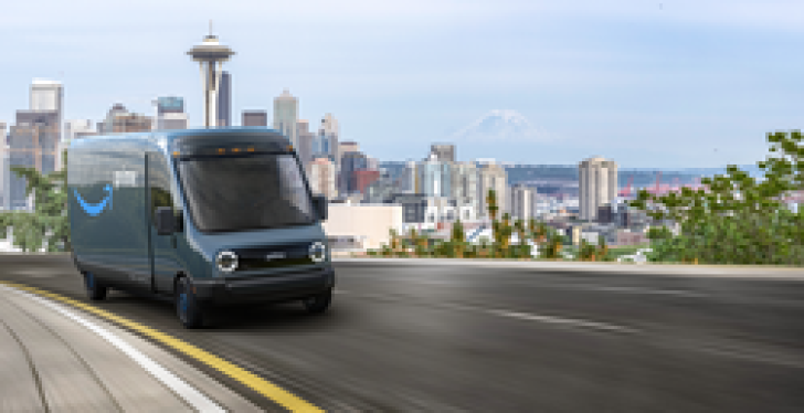 An electric delivery van drives on a road with the Seattle skyline in the background.
