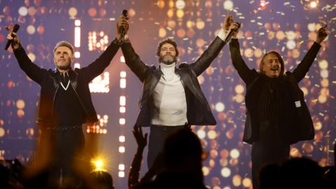 Take That perform onstage during the finale of The National Lottery's Big Bash to celebrate 2023 at OVO Arena Wembley on 6 December 2023 in London, England