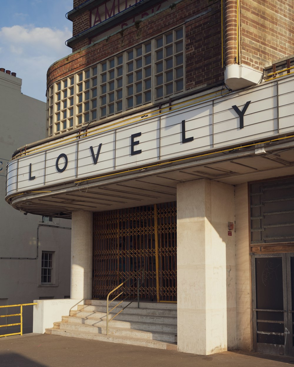 a building with a sign that says lovelyly on it