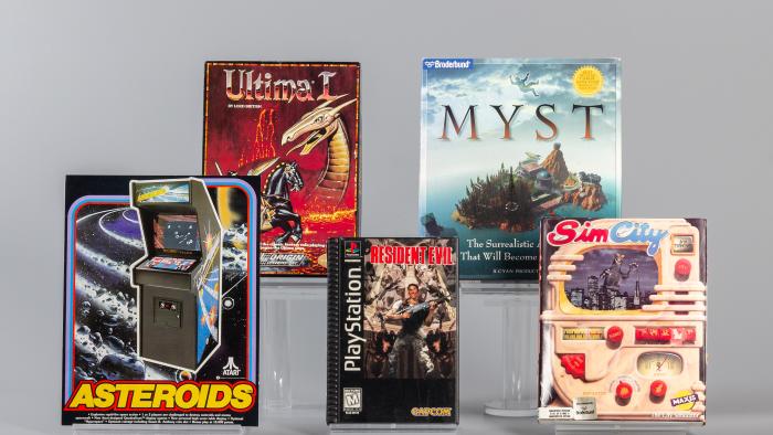 World Video Game Hall of Fame 2024 inductees with cover art for Asteroids, Myst, Resident Evil, SimCity and Ultima.
