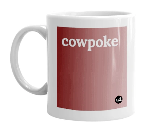 White mug with 'cowpoke' in bold black letters