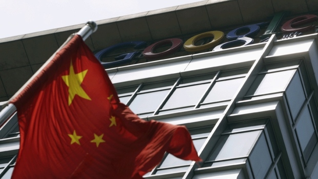 A Chinese national flag waves in front of the former headquarters of Google China in Beijing. Google closed the headquarters in 2010 after a series of hacking attacks traced to China. It has now said it will start flagging suspected state-sponsored attacks to its users.