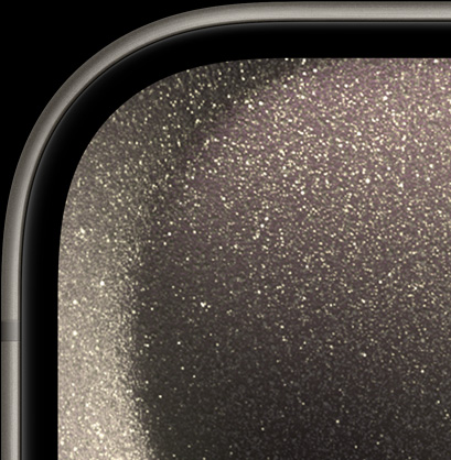 Widok w zbliżeniu na przód iPhone’a 15 Pro eksponujący jego zaokrąglone krawędzie i wąską ramkę ekranu