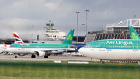 File Photo Aer Lingus is to impose further temporary pay cuts on staff, who will only receive 30% of their normal pay and hours